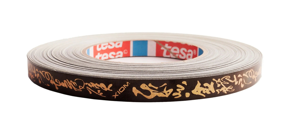 Xiom Side tape Mandarine 12mm-50m black/gold Xiom SE - tabletennisstore.eu